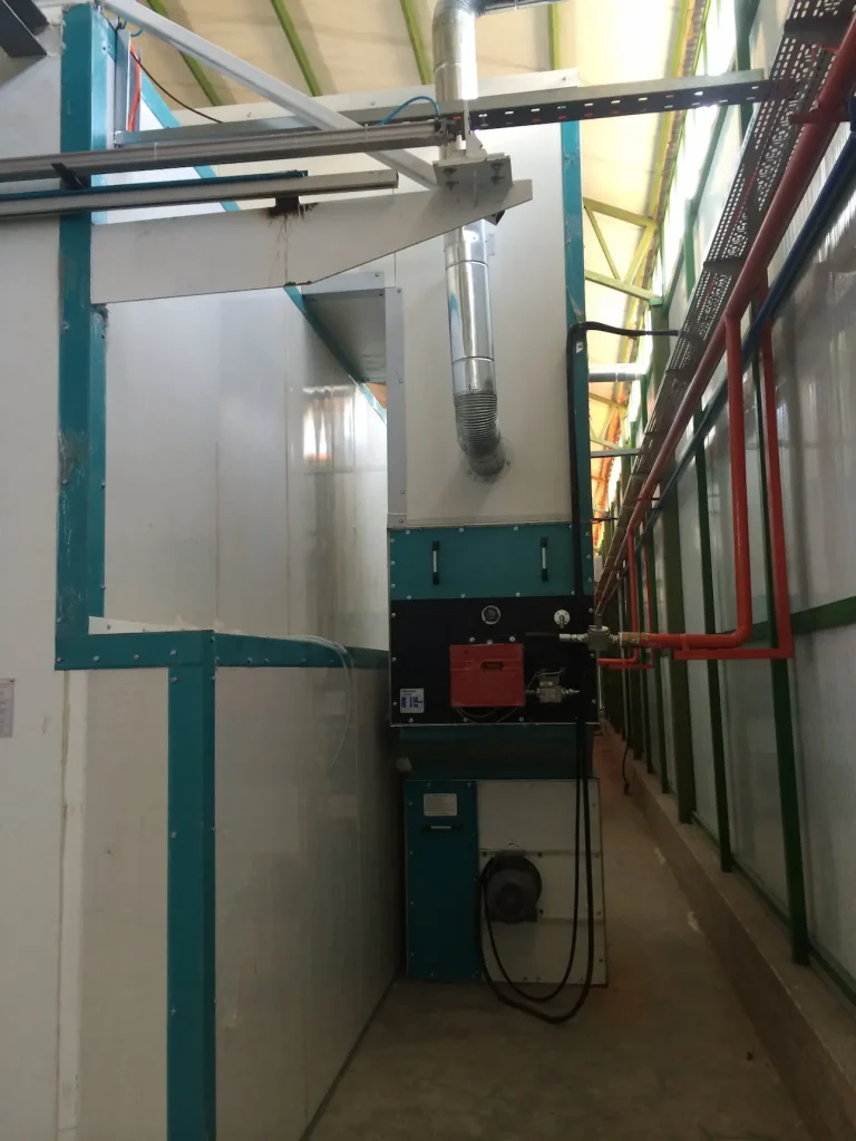 Gas-fired curing oven for heavy-duty excavator components.